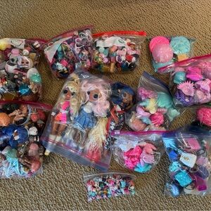Huge lot of Lol dolls, OMG dolls, pets, and many accessories. Easter